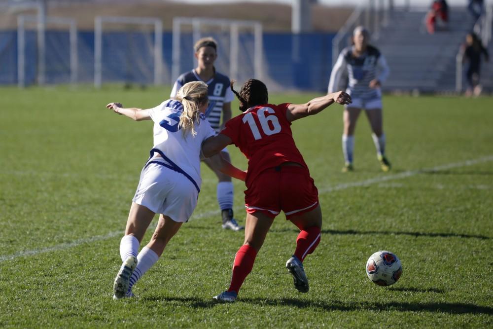 GVL / Luke Holmes - Kendra Stauffer (5) fights for the ball. GVSU Women's Soccer won 2-0 against Missouri St. Louis on Sunday, Nov. 13, 2016.