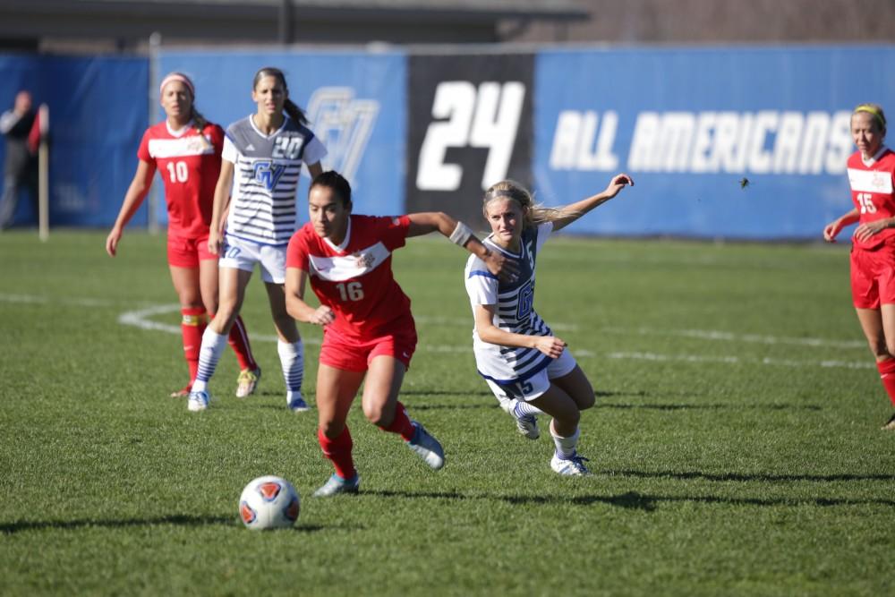 GVL / Luke Holmes - Kendra Stauffer (5) fights for the ball. GVSU Women's Soccer won 2-0 against Missouri St. Louis on Sunday, Nov. 13, 2016.