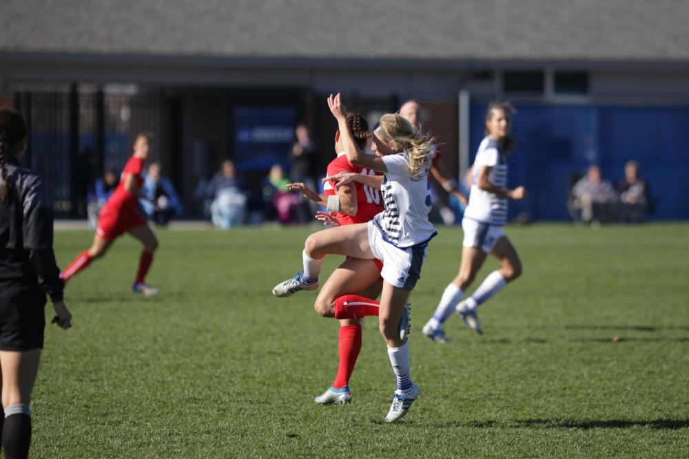 GVL / Luke Holmes - Kendra Stauffer (5) fights for the ball. GVSU Women's Soccer won 2-0 against Missouri St. Louis on Sunday, Nov. 13, 2016.