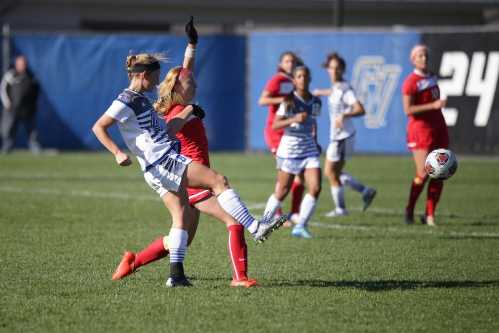 GVL / Luke Holmes - Tara Lierman (8) passes the ball. GVSU Women's Soccer won 2-0 against Missouri St. Louis on Sunday, Nov. 13, 2016.