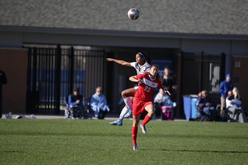 GVL / Luke Holmes - Jayma Martin (12) fights for the header. GVSU Women's Soccer won 2-0 against Missouri St. Louis on Sunday, Nov. 13, 2016.