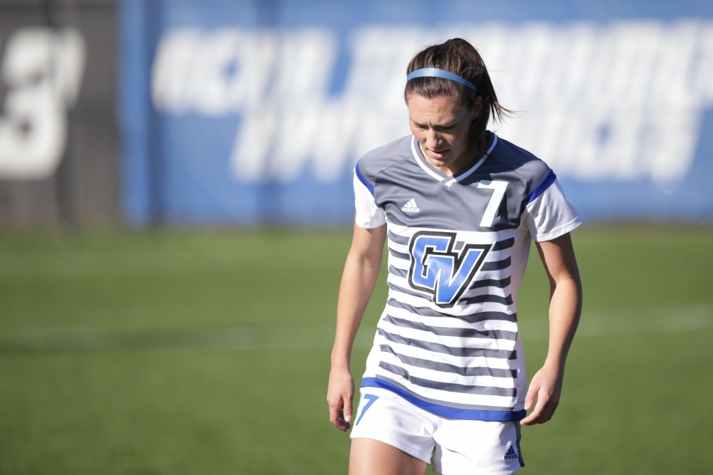 GVL / Luke Holmes - Clare Carlson (7) walks towards the bench after play is stopped. GVSU Women's Soccer won 2-0 against Missouri St. Louis on Sunday, Nov. 13, 2016.