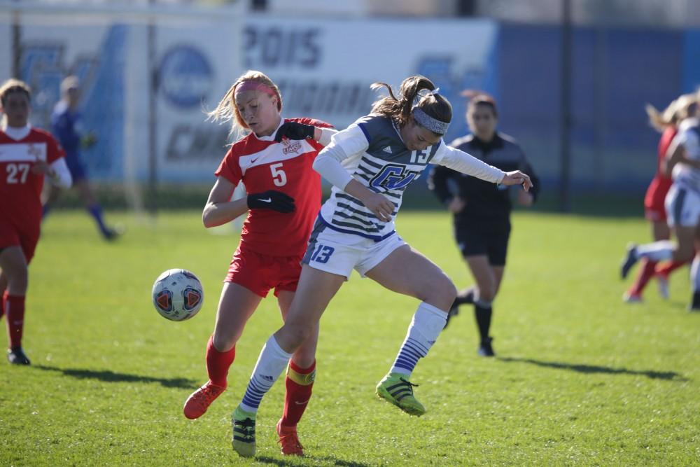 GVL / Luke Holmes - Marti Coby (13) fights for the ball. GVSU Women's Soccer won 2-0 against Missouri St. Louis on Sunday, Nov. 13, 2016.