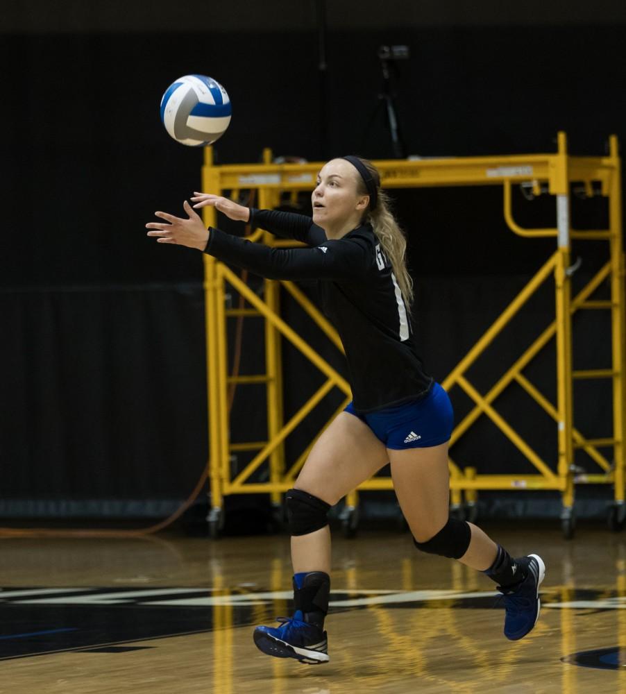 GVL/Kevin Sielaff - Amanda Glaza (13) serves the ball. The Lakers fall to the Bulldogs of Ferris State with a final score of 1-3 Tuesday, Sept. 27, 2016 in Allendale.