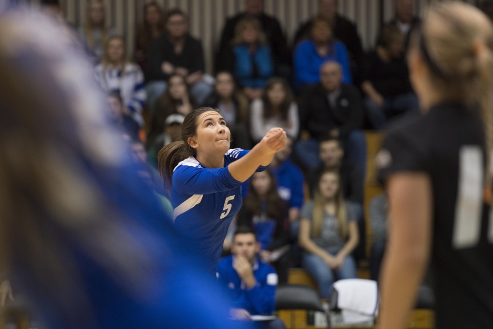 GVL / Luke Holmes - Taylor Stewart (5) bumps the ball. GVSU volleyball defeated Northwood in three games in the Fieldhouse Arena on Friday, Nov. 11, 2016.