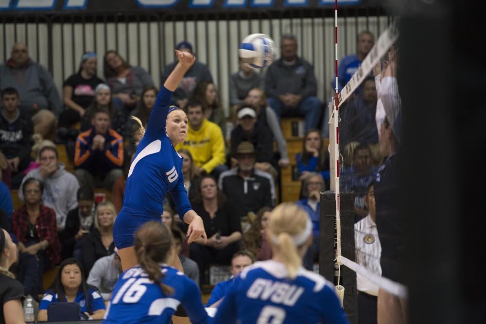 GVL / Luke Holmes - Mailyn Keller (10) spikes the ball. GVSU volleyball defeated Northwood in three games in the Fieldhouse Arena on Friday, Nov. 11, 2016.