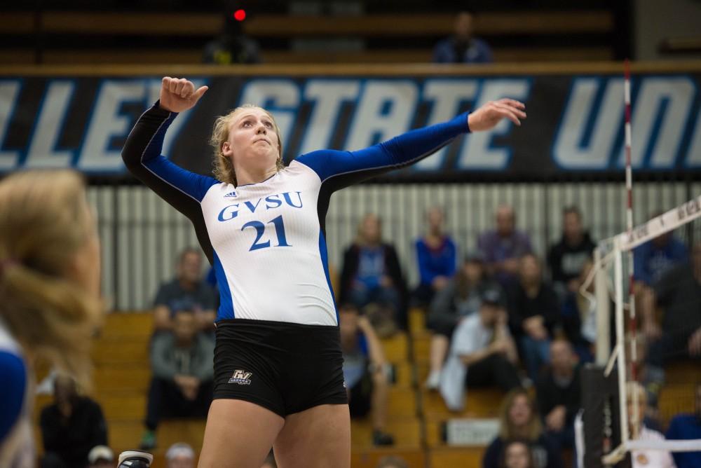 GVL / Luke Holmes - Staci Brower (21) jumps up for the hit. GVSU volleyball lost to Michigan Tech on Saturday, Oct. 29. 2016.