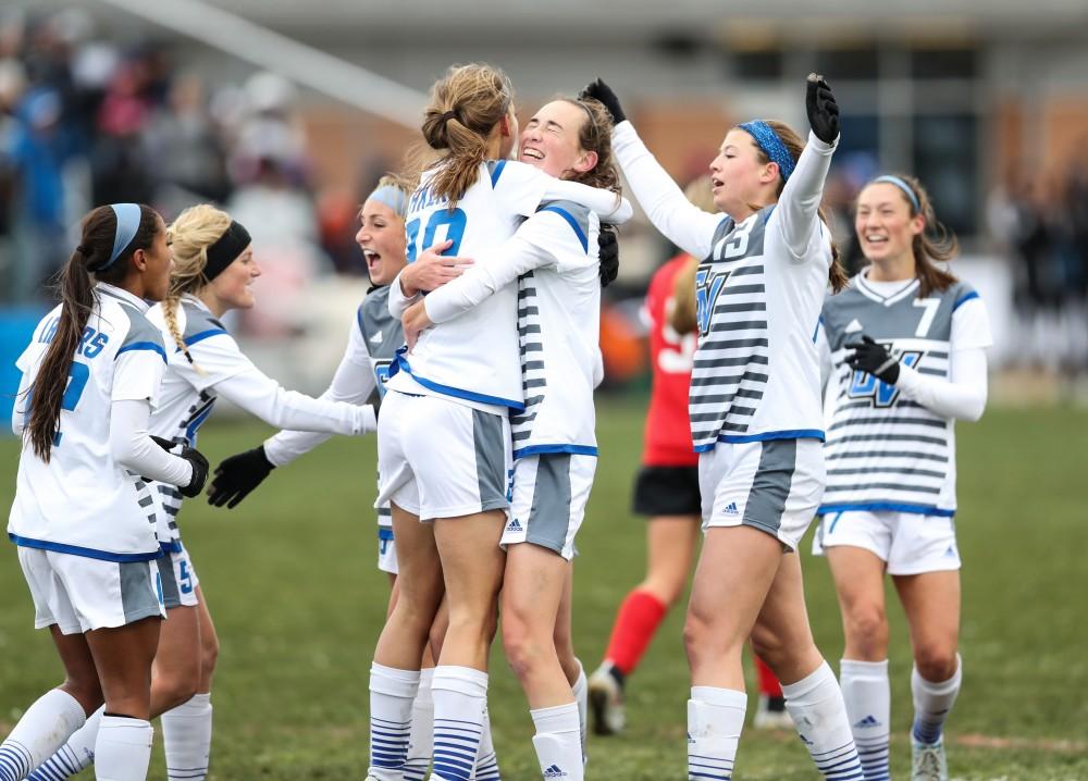 GVL/Kevin Sielaff - Shannon Quinn (10) and company celebrate a Laker goal during the game versus Central Missouri on Sunday, Nov. 20, 2016 in Allendale.