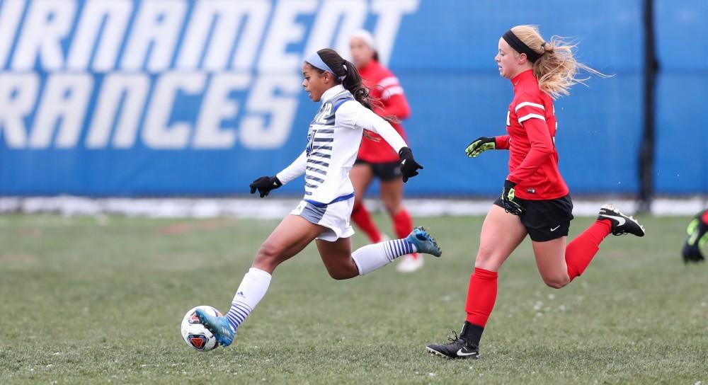 GVL/Kevin Sielaff - Jayma Martin (12) sends a pass up field during the game versus Central Missouri on Sunday, Nov. 20, 2016 in Allendale.