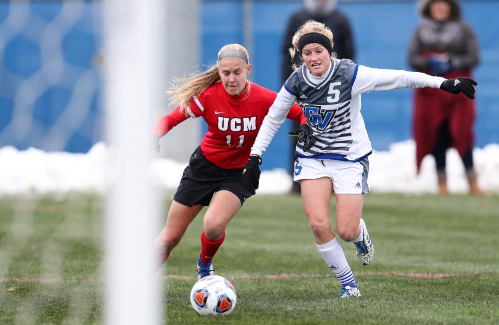 GVL/Kevin Sielaff - Kendra Stauffer (5) jukes her way toward Central Missouri's net during the game versus Central Missouri on Sunday, Nov. 20, 2016 in Allendale.