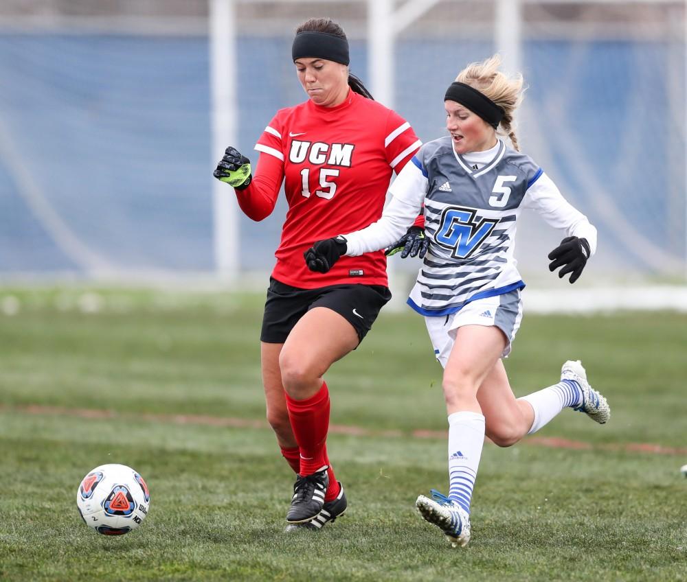 GVL/Kevin Sielaff - Kendra Stauffer (5) battles with Callie Henshaw (15) for possession of the ball during the game versus Central Missouri on Sunday, Nov. 20, 2016 in Allendale.