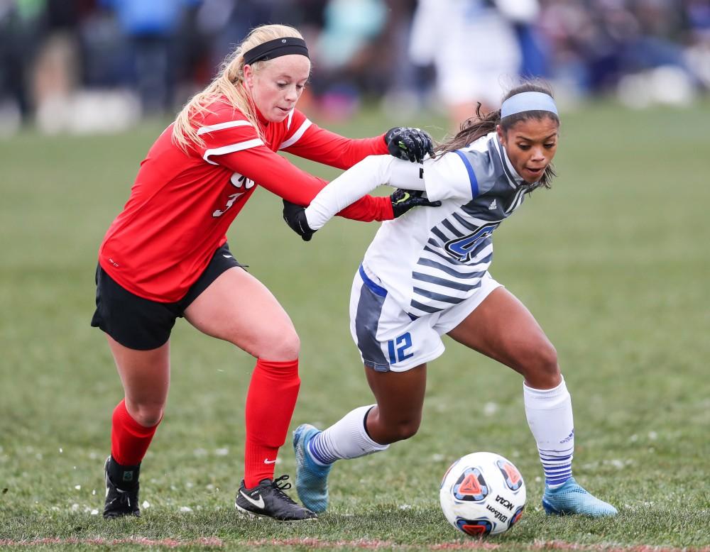 GVL/Kevin Sielaff - Jayma Martin (12) battles with Taylor Hughes (3) for possession of the ball during the game versus Central Missouri on Sunday, Nov. 20, 2016 in Allendale.