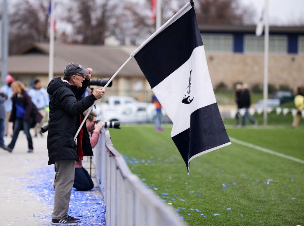 GVL / Emily Frye
A fan cheers on the Western Washington Vikings during the National Championship finals game on Saturday Dec. 3, 2016.