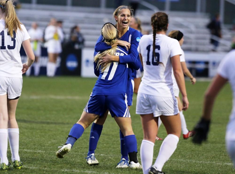 GVL / Emily Frye
Gabriella Mencotti and Sara Stevens celebrate a Laker goal during the National Championship finals game on Saturday Dec. 3, 2016.