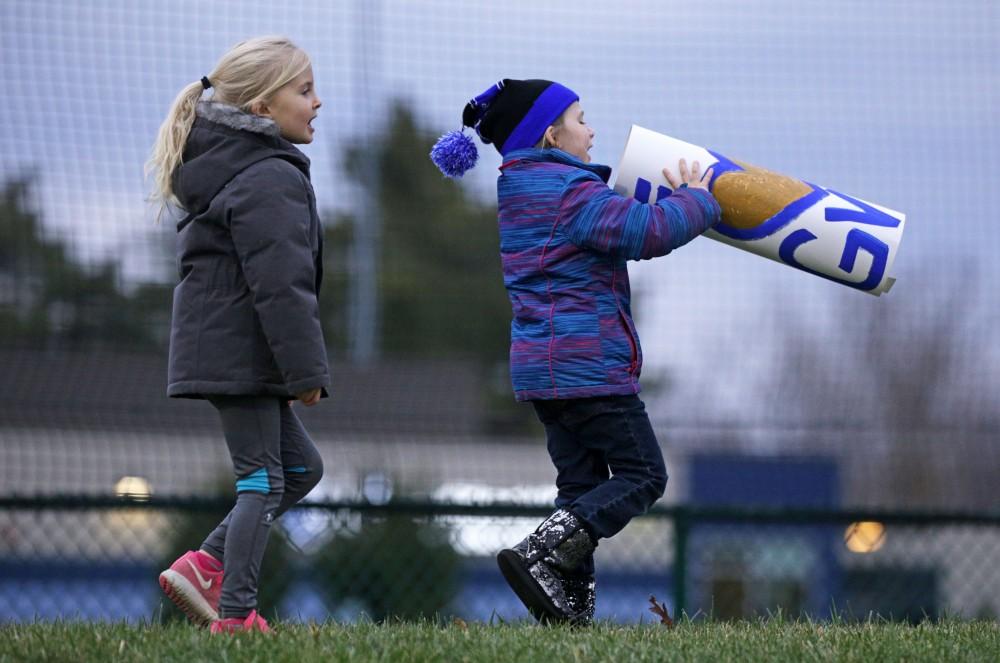 GVL / Emily Frye
Some little Lakers support their team during the National Championship finals game on Saturday Dec. 3, 2016.