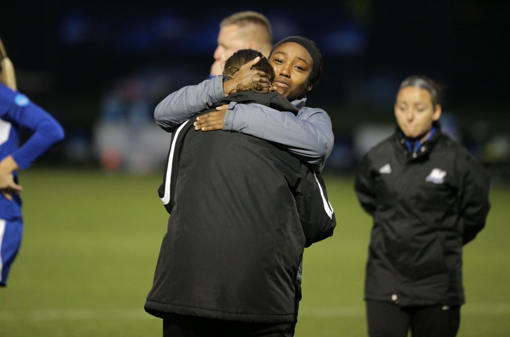 GVL / Emily Frye
Alexis Dandridge comforts Alexis Mencotti after the final game on Saturday Dec. 3, 2016.