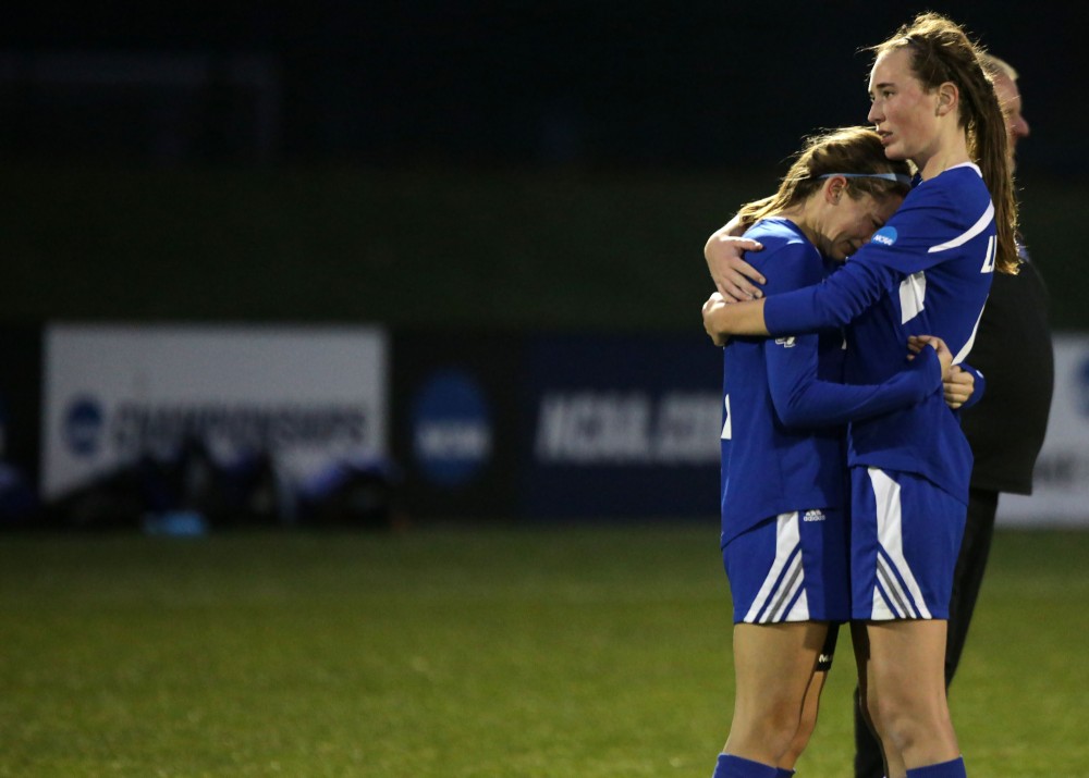 GVL / Emily Frye
Shannon Quinn comforts Clare Carlson after the final  game on Saturday Dec. 3, 2016.