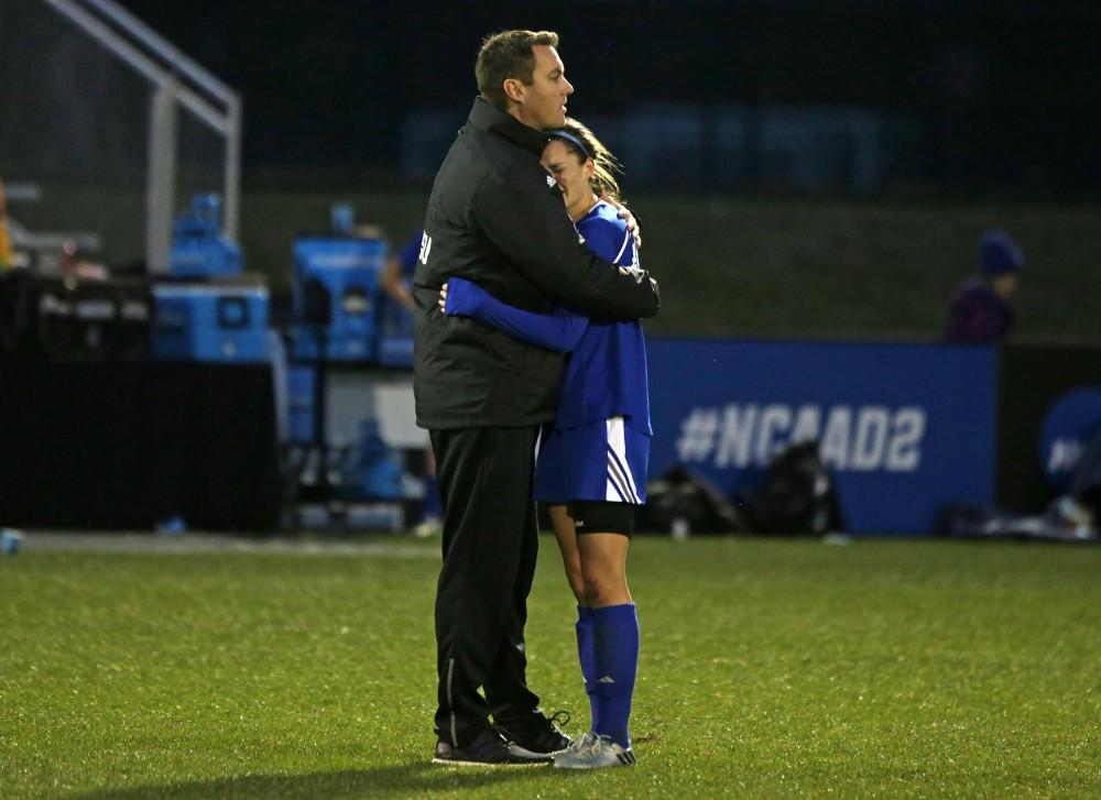 GVL / Emily Frye
Clare Carlson and Coach Jeff Hosler after the final game on Saturday Dec. 3, 2016.