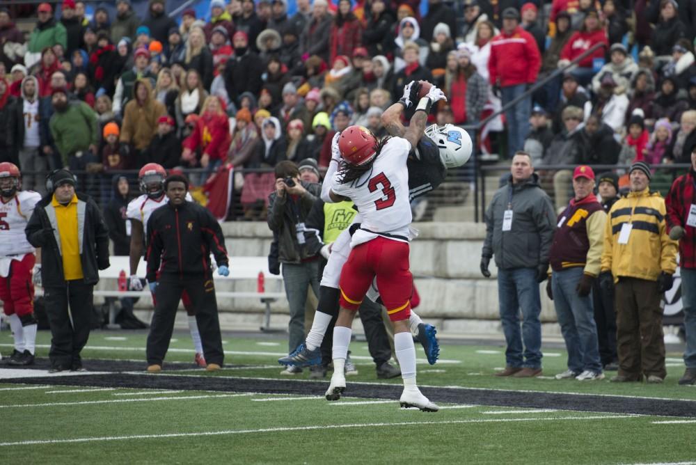 GVL / Luke Holmes - Nick Dodson (11) jumps and makes the catch. GVSU lost to Ferris State in Lubbers Stadium on Saturday, Dec. 3, 2016.