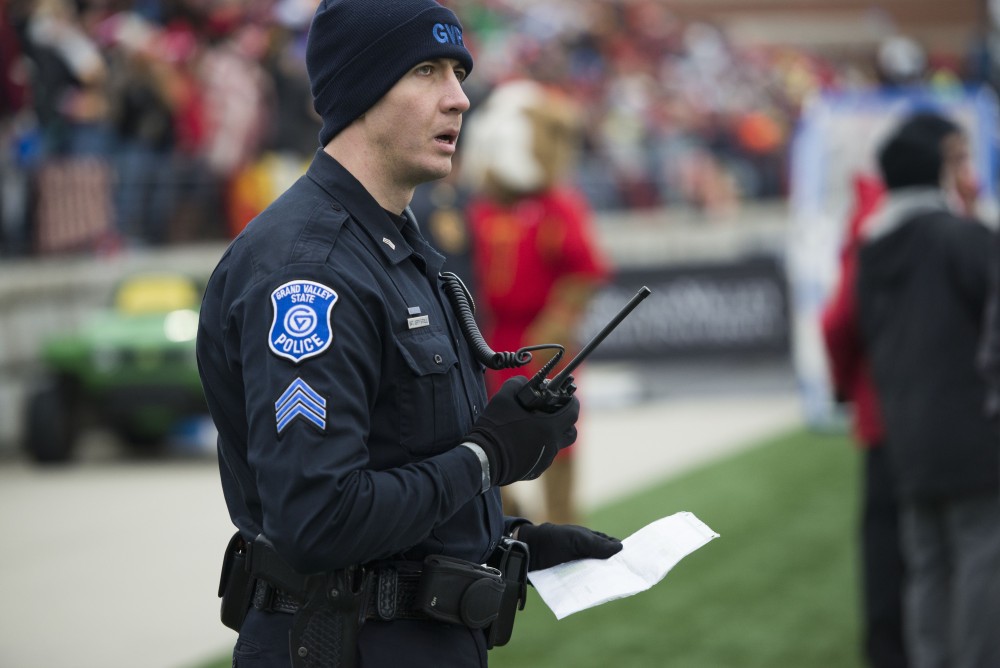 GVL / Luke Holmes - Sergeant Stoll stands on the sidelines. GVSU lost to Ferris State in Lubbers Stadium on Saturday, Dec. 3, 2016.