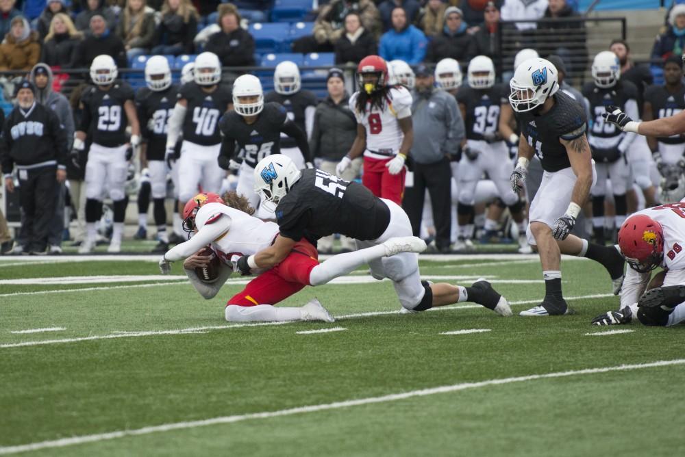 GVL / Luke Holmes - Dylan Carroll (54) makes the tackle. GVSU lost to Ferris State in Lubbers Stadium on Saturday, Dec. 3, 2016.