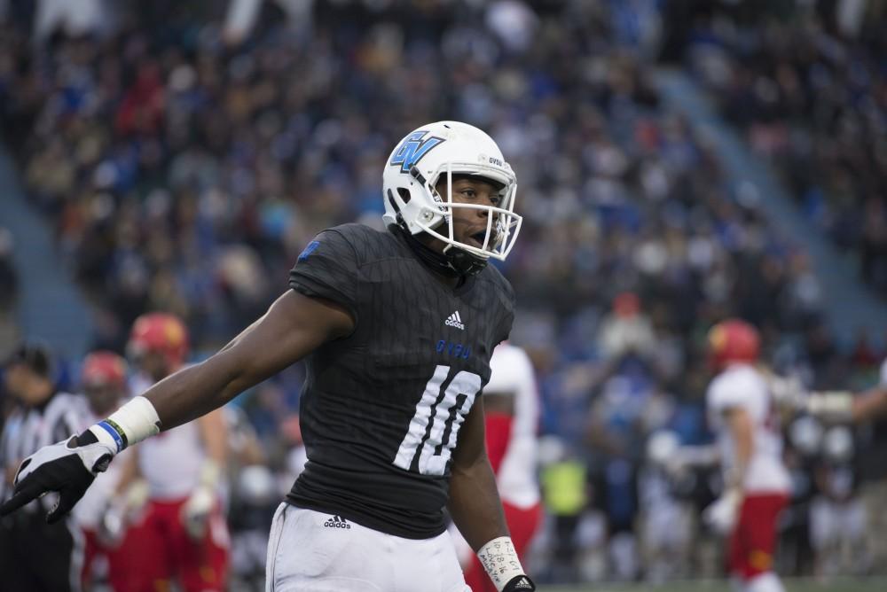 GVL / Luke Holmes - Urston Smith (10) runs by the sideline. GVSU lost to Ferris State in Lubbers Stadium on Saturday, Dec. 3, 2016.