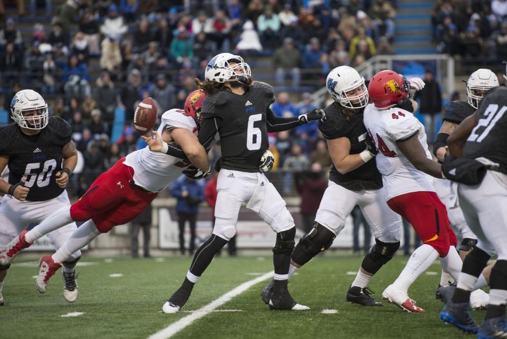 GVL / Luke Holmes - Bart Williams (6) gets sacked from behind. GVSU lost to Ferris State in Lubbers Stadium on Saturday, Dec. 3, 2016.