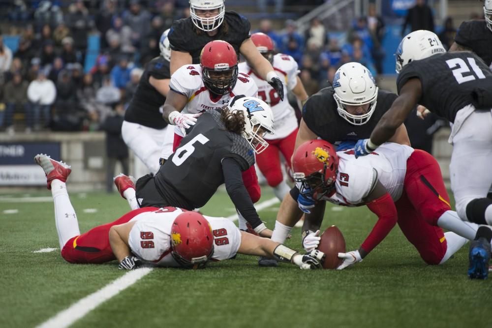 GVL / Luke Holmes - Ferris State recovers a fumble. GVSU lost to Ferris State in Lubbers Stadium on Saturday, Dec. 3, 2016.