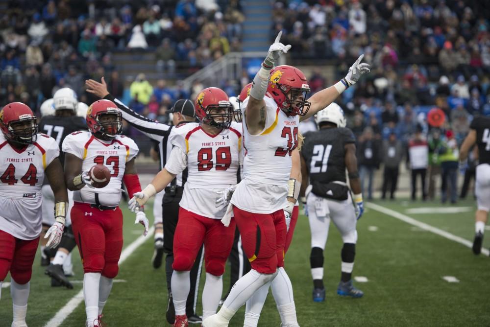 GVL / Luke Holmes - Ferris State celebrates after making the defensive play. GVSU lost to Ferris State in Lubbers Stadium on Saturday, Dec. 3, 2016.