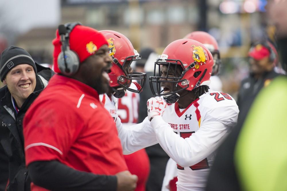 GVL / Luke Holmes - Keyon Addison (25) of Ferris State cheers from the bench. GVSU lost to Ferris State in Lubbers Stadium on Saturday, Dec. 3, 2016.