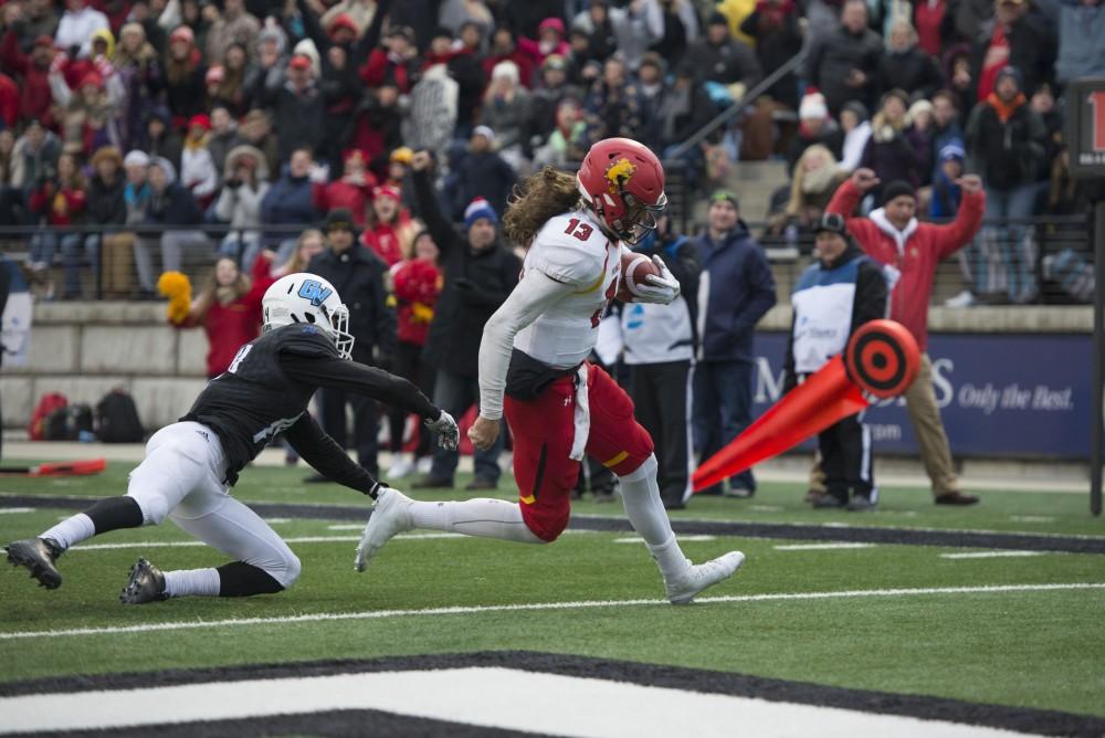 GVL / Luke Holmes - Marquis Dawsey (13) of Ferris State runs in the touchdown. GVSU lost to Ferris State in Lubbers Stadium on Saturday, Dec. 3, 2016.