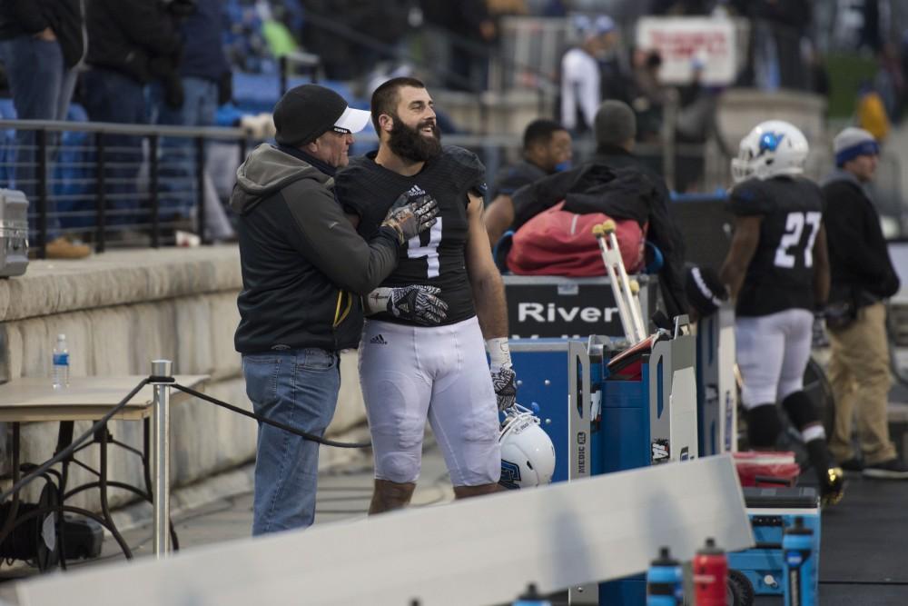 GVL / Luke Holmes - Alton Voss (4) watches toward the play from the bench. GVSU lost to Ferris State in Lubbers Stadium on Saturday, Dec. 3, 2016.