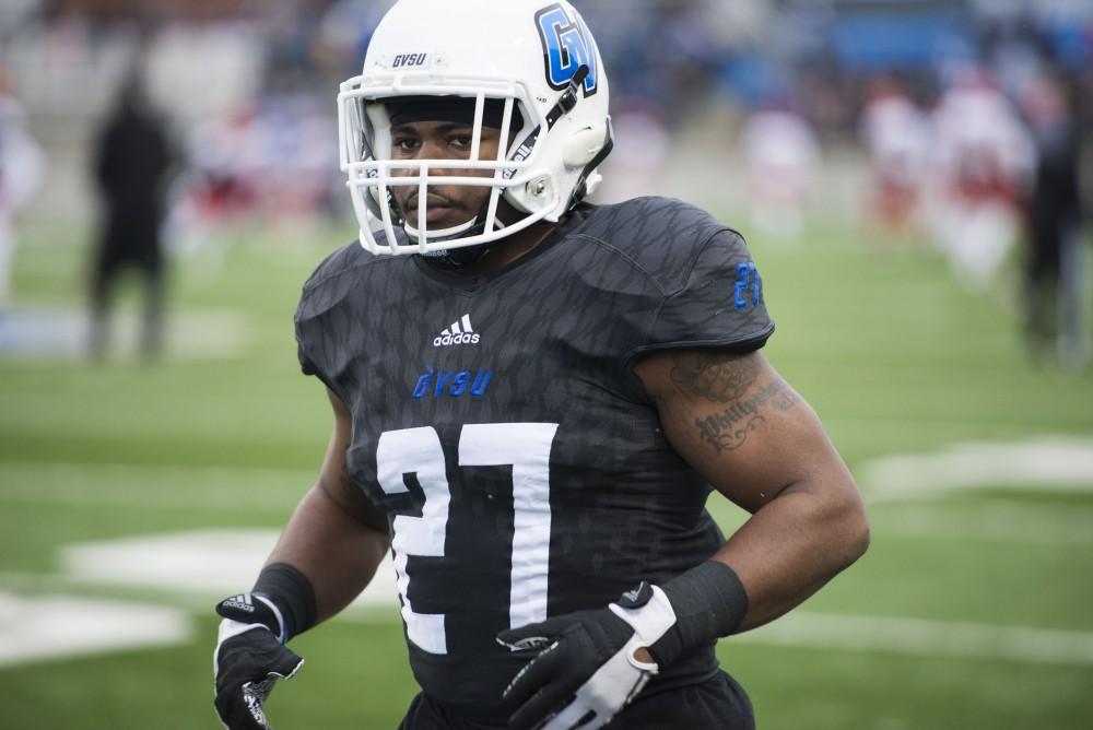 GVL / Luke Holmes - Bryce Young-Walls (27) warms up before the game. GVSU lost to Ferris State in Lubbers Stadium on Saturday, Dec. 3, 2016.