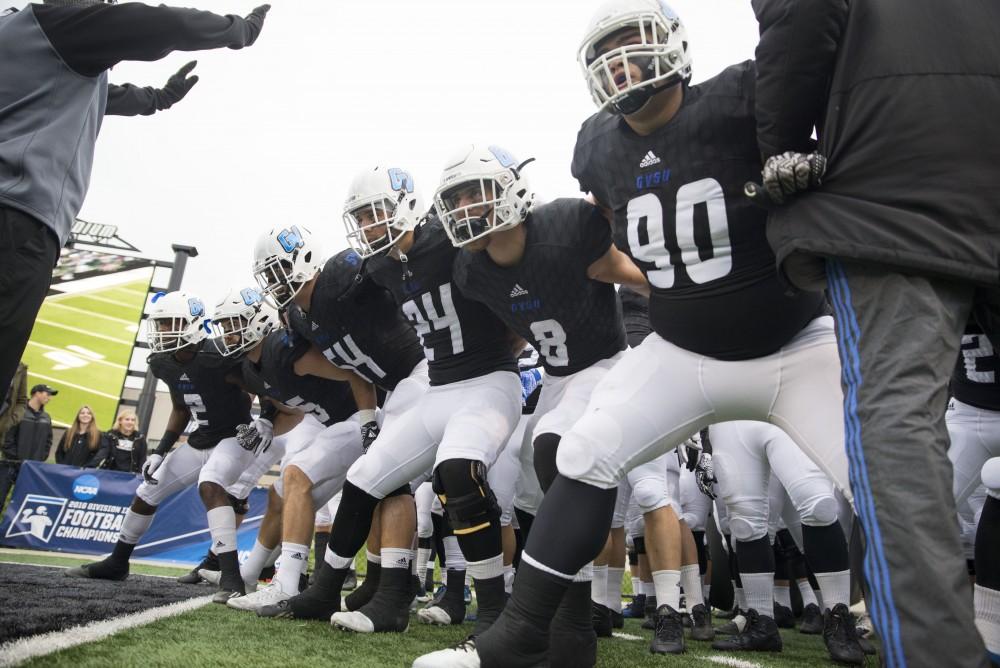 GVL / Luke Holmes - Players get ready to charge onto the field. GVSU lost to Ferris State in Lubbers Stadium on Saturday, Dec. 3, 2016.