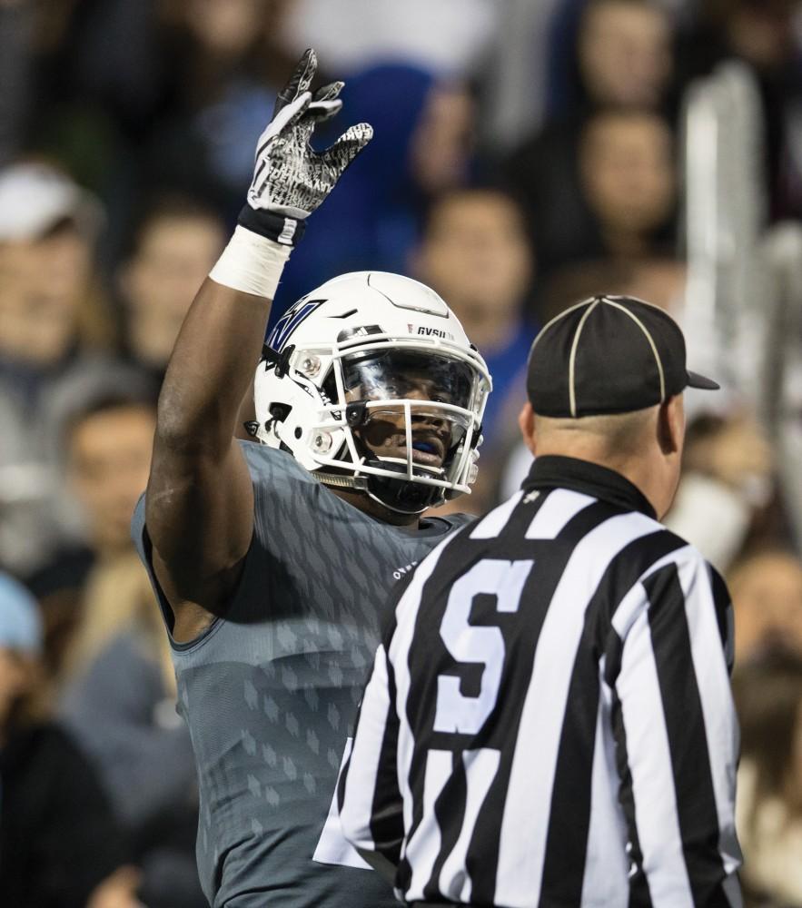 GVL/Kevin Sielaff - Marty Carter (21) celebrates a Grand Valley touchdown. The Lakers defeat the Bulldogs of Ferris State University Saturday, Oct. 8, 2016 with a final score of 35-23 in Allendale. 