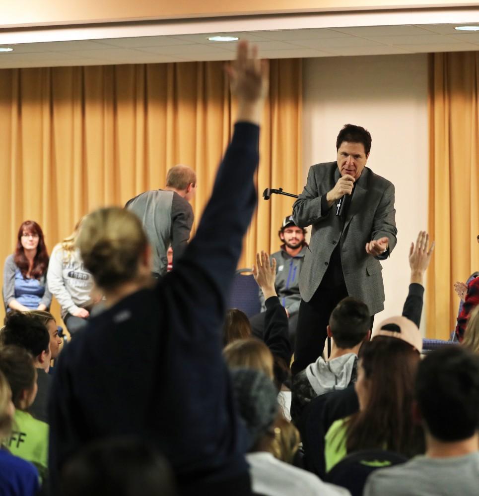 GVL/Kevin Sielaff - Hypnotist Tom Deluca picks audience members to hypnotize inside the Kirkhof Center's Grand River Room on Wednesday, Nov. 30, 2016. 