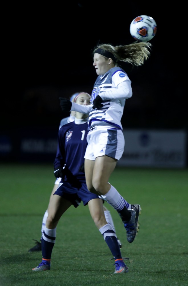 GVL / Emily Frye 
Tara Lierman heads the ball during the semi final game on Thursday Dec. 1, 2016. 