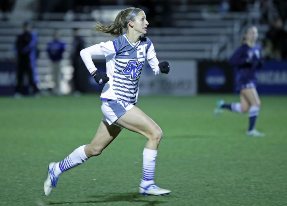 GVL / Emily Frye 
Gabriella Mencotti chases the ball down the field during the semi finals game on Thursday Dec. 1, 2016. 