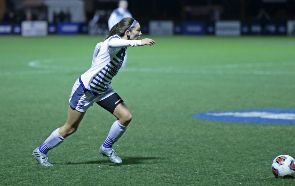 GVL / Emily Frye 
Clare Carlson takes the ball down the field during the semi finals game on Thursday Dec. 1, 2016. 