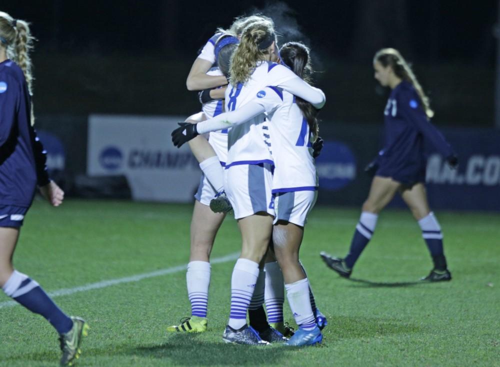 GVL / Emily Frye
The Grand Valley State Lakers celebrate Kendra Stauffer's goal during the semi final round on Thursday Dec. 1, 2016. 