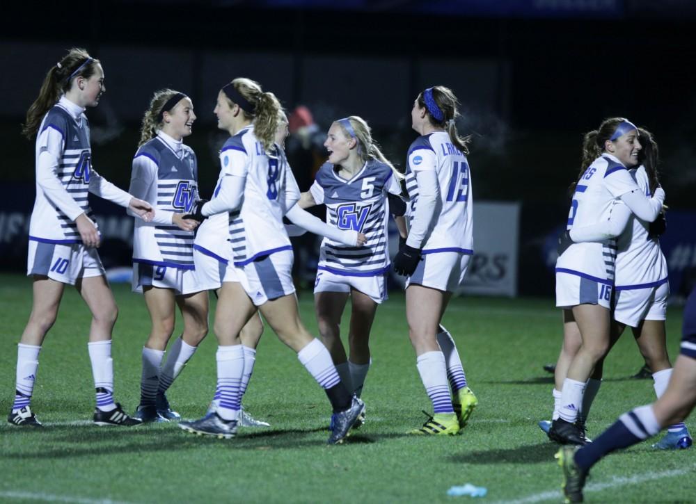 GVL / Emily Frye
The Grand Valley State Lakers celebrate their win over Colombus State during the semi final round on Thursday Dec. 1, 2016. 