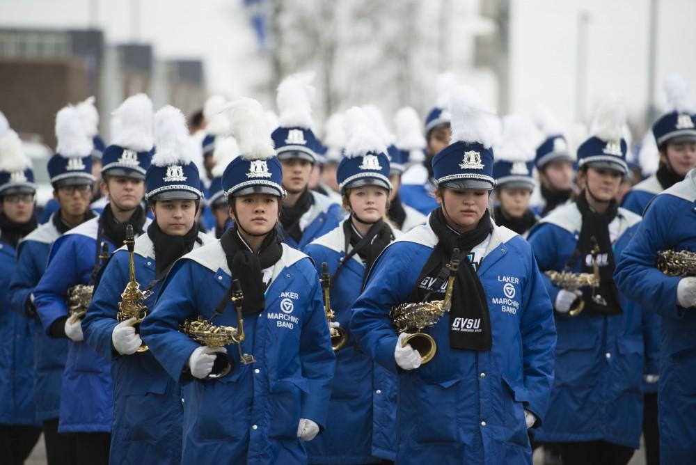 GVL / Luke Holmes - The Laker Marching Band marches to Lubber’s Stadium on Saturday, Dec. 3, 2016.