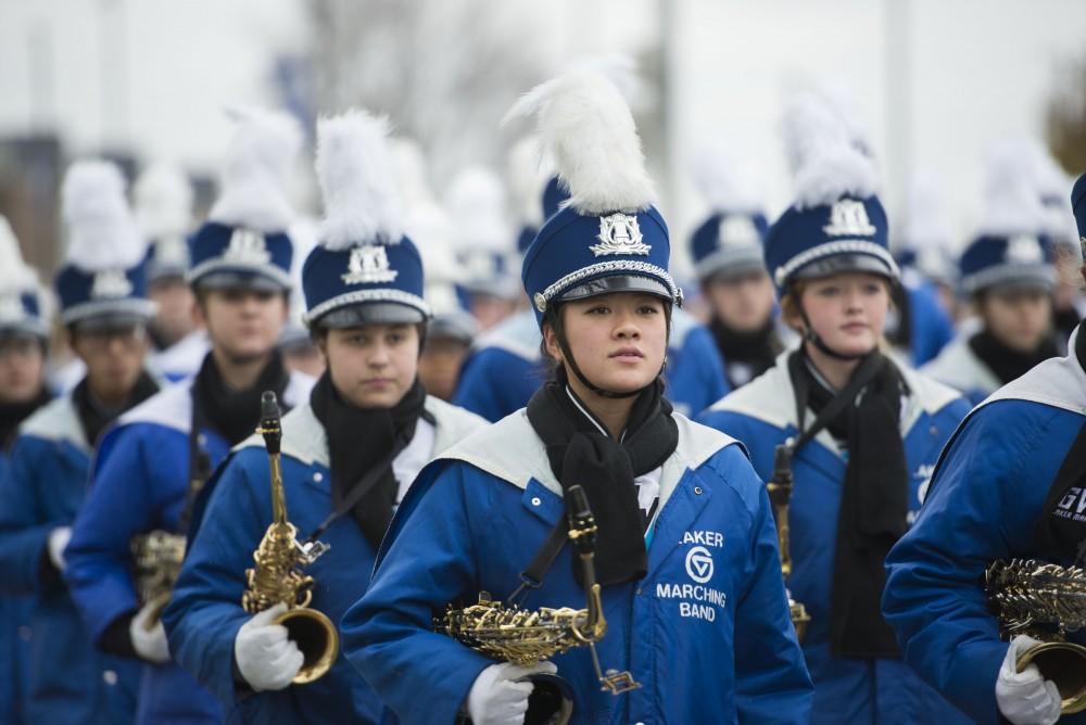 GVL / Luke Holmes - The Laker Marching Band marches to Lubber’s Stadium on Saturday, Dec. 3, 2016.