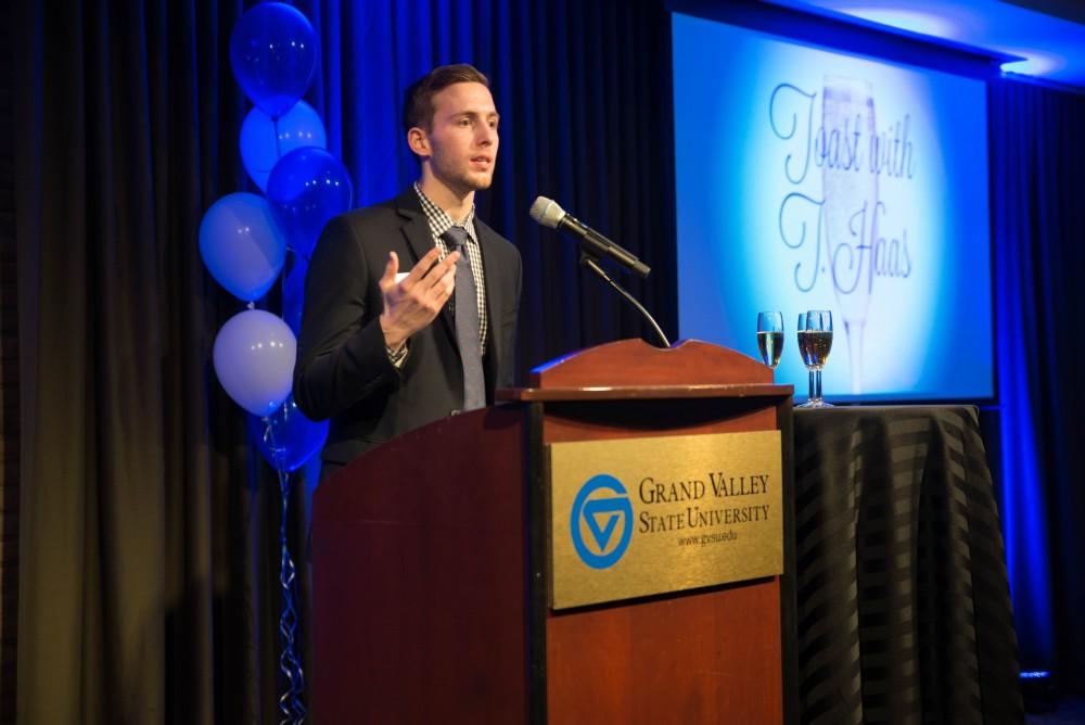 GVL / Luke Holmes - Students celebrate a "Toast with T. Haas" in the Eberhard Center on Thursday, Dec. 8, 2016.