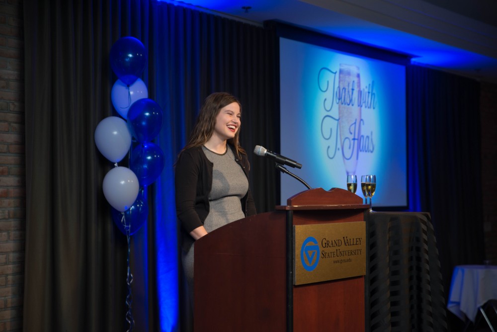 GVL / Luke Holmes - Ella Fritzemeier gives a speech. Students celebrate a "Toast with T. Haas" in the Eberhard Center on Thursday, Dec. 8, 2016.