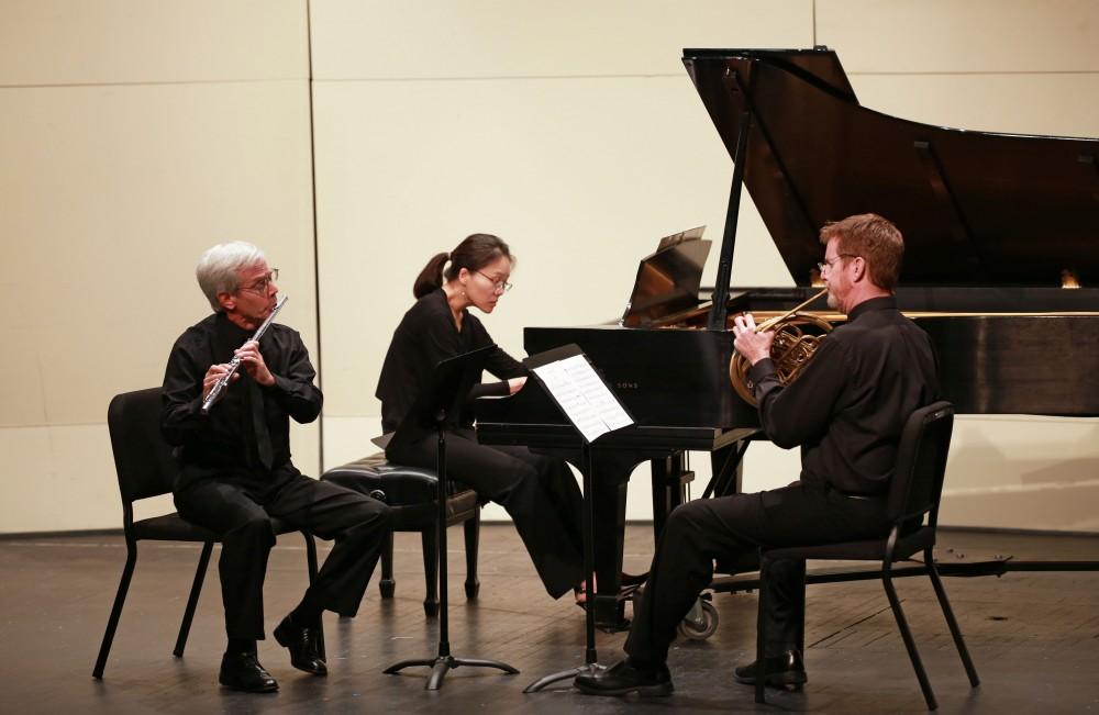 GVL / Kevin Sielaff
Grand Rapids Symphony performs Christopher Kantner (flute), Richard Britsch (horn), and Sookkyung Cho (piano), perform "Souvenir du Rigi."  The GVSU music department presents a faculty concert as a part of Fall Art Celebration Sept. 21 in the Louis Armstrong Theatre. 