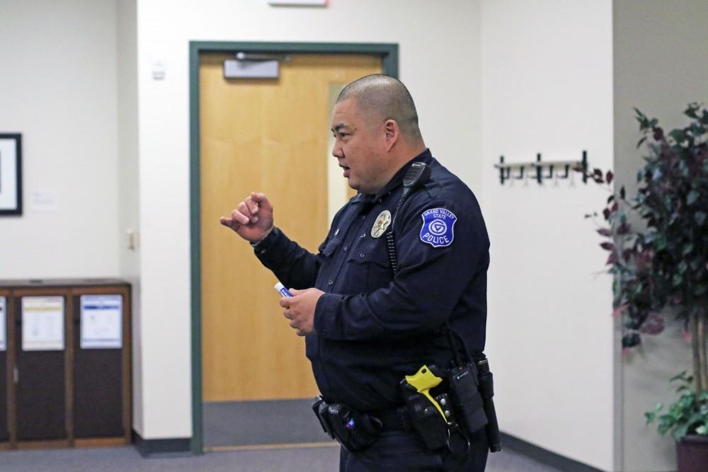 GVL / Emily Frye      
Grand Valley's Officer Min teaches a group of students about being safe with substances on Wednesday Jan. 25, 2016.