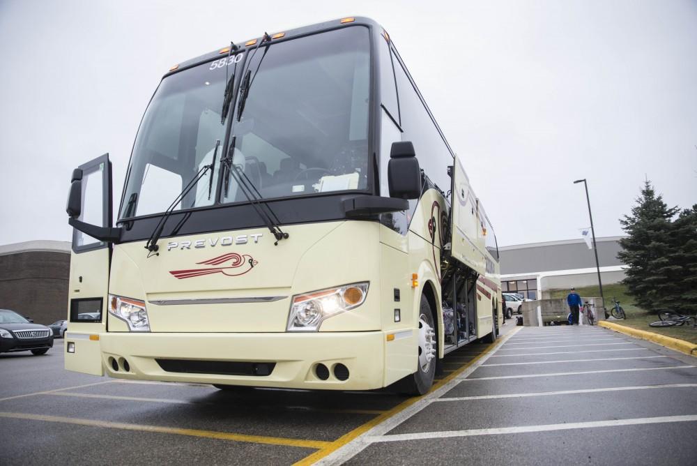 GVL / Luke Holmes - The basketball teams load the bus and set off for up north.