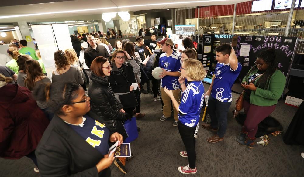 GVL/Kevin Sielaff - Students gather to speak with the Quidditch Club in the upstairs dining area of the Kirkhof Center for Campus Life Night 2.0 which takes place on Friday, Jan. 13, 2017.