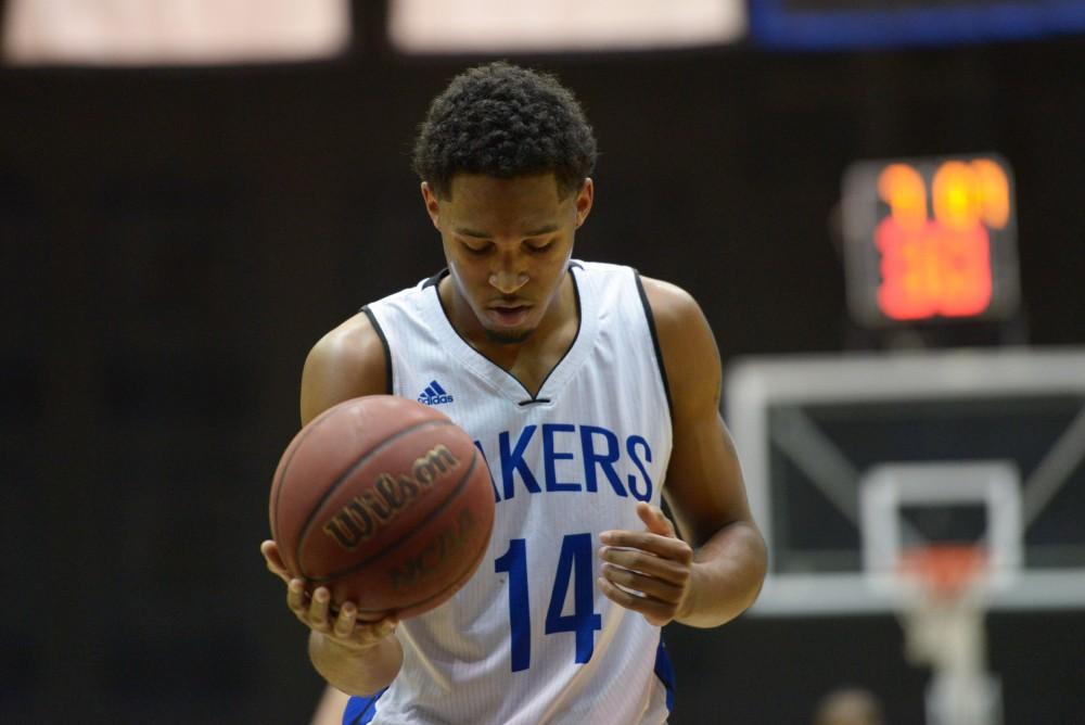 GVL / Luke Holmes - Chris Dorsey (14) gets ready to shoot from the line. GVSU men’s basketball defeated Wayne State University on Thursday, Jan.19, 2017.